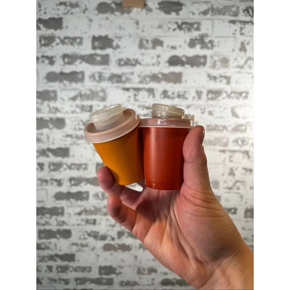 Tupperware | vintage spice salt and pepper shakers orange and red
